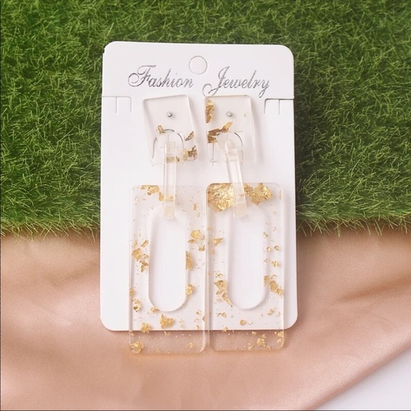 Gold and clear resin sparkle earrings. Rectangle - Picture 3 of 4